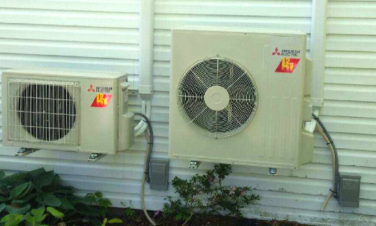 Small outside AC units on side of house