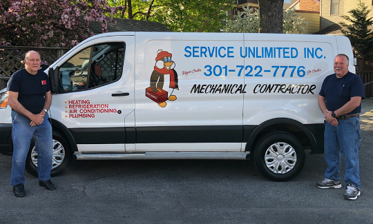 Service Unlimited van with owners