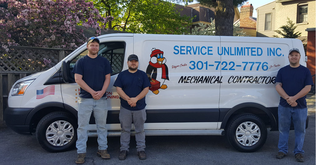 Service Unlimited van with employees